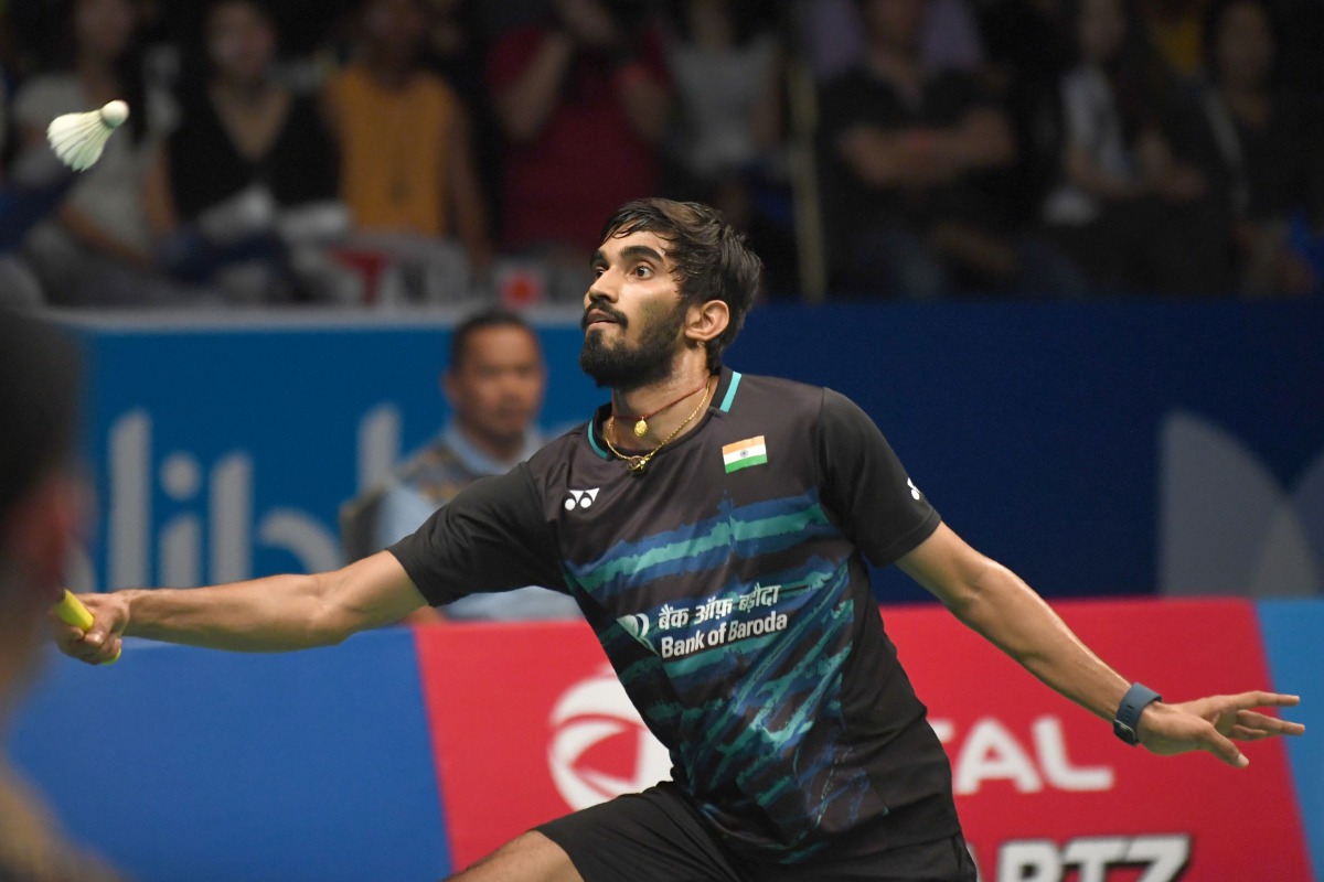 Srikanth Kidambi of India returns a shot against Kazumasa Sakai of Japan in the men's singles final of the Indonesia Open badminton tournament in Jakarta on June 18, 2017. (AFP / GOH Chai Hin)