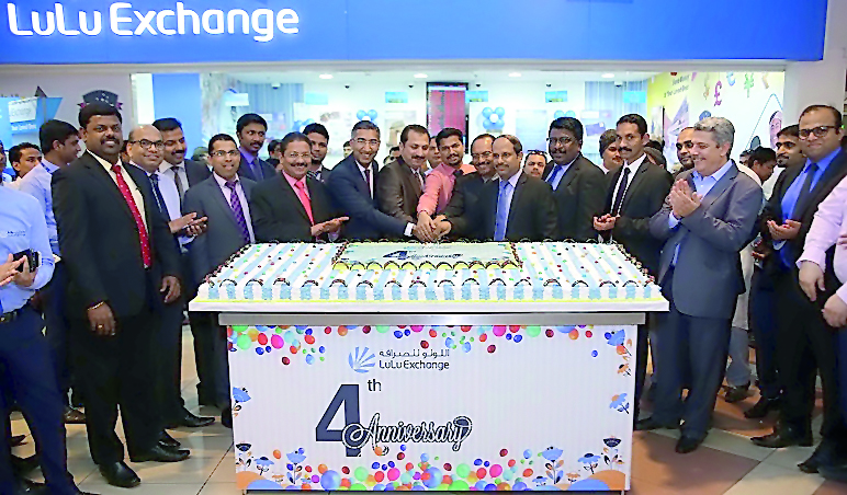 The 4th anniversary celebration of Lulu Exchange being held at the company’s D-Ring Road branch in the presence of Shaijan M O, Regional Director, Lulu Hypermarket; Shanavas P M, Regional Manager, Lulu Hypermarket: Rafi V S, Administration Manager, Lulu H