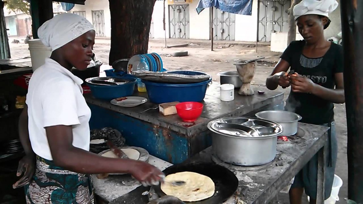 Women preparing dishes in Dar Es Salaam in this video grab dated Jun 19, 2013 (Photo courtesy: Frank Starmer / YouTube)  