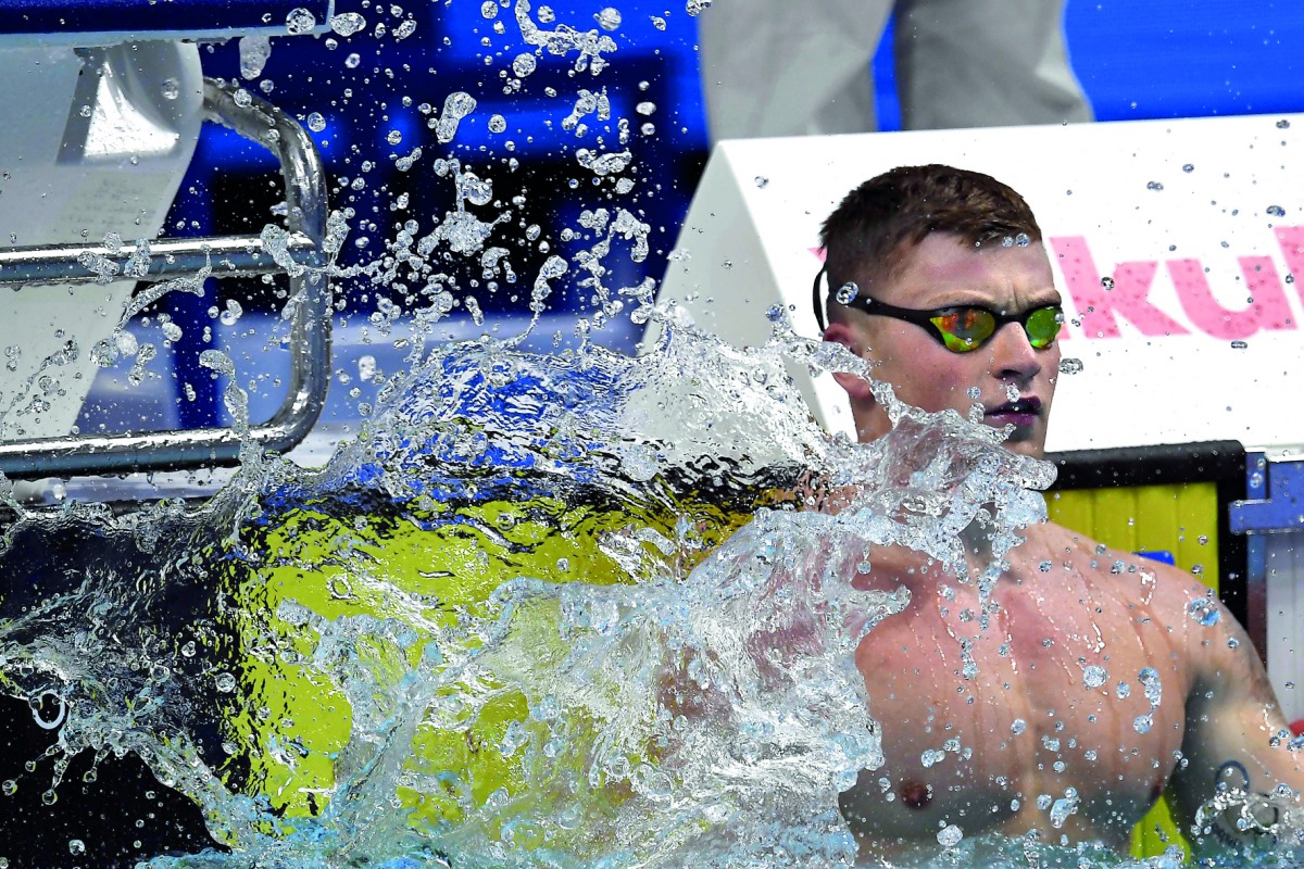 Great Britain’s Adam Peaty reacts after making a new world record in a heat of the men’s 50m breaststroke during the swimming competition at the 2017 FINA World Championships in Budapest, yesterday.