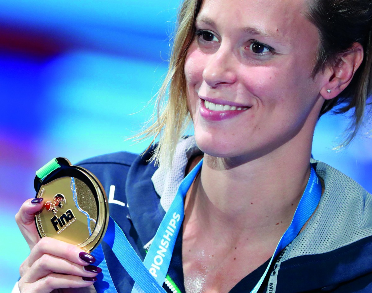 Federica Pellegrini (gold) of Italy poses with the medal.