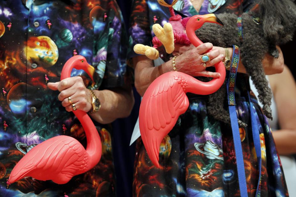 Don and Nancy Featherstone hold their creation, the pink flamingo lawn ornament, at Harvard University in Cambridge, Massachusetts September 20, 2012. Jessica Rinaldi/Reuters