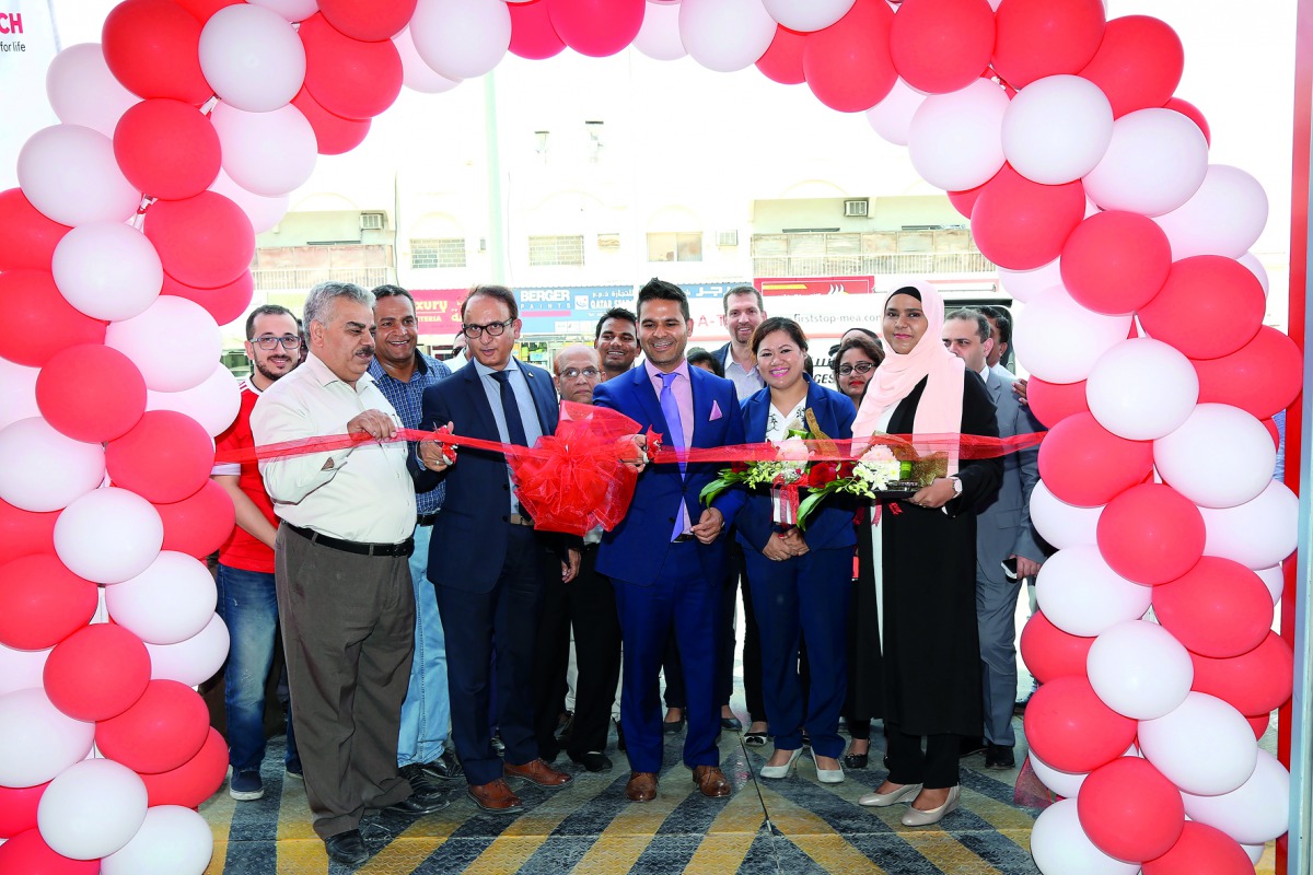 Senior officials of Aamal Trading and Distribution, and Bridgestone Europe, including Syed Rashid Hassan, General Manager of Aamal Trading, at the opening ceremony. 