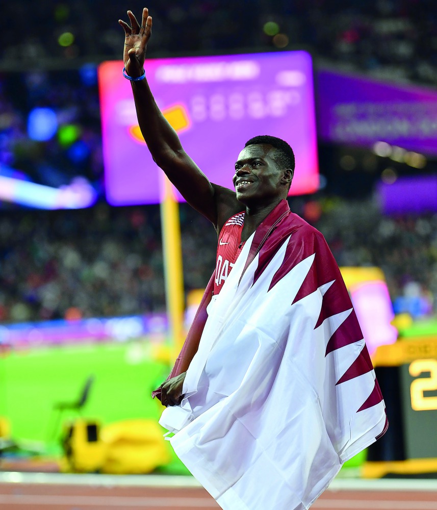 Abdalelah Haroun celebrates with a Qatari flag after winning the bronze medal in the Men’s 400m of IAAF Athletics World Championships London 2017 at London Stadium in the Queen Elizabeth Olympic Park in London, United Kingdom on  Tuesday.