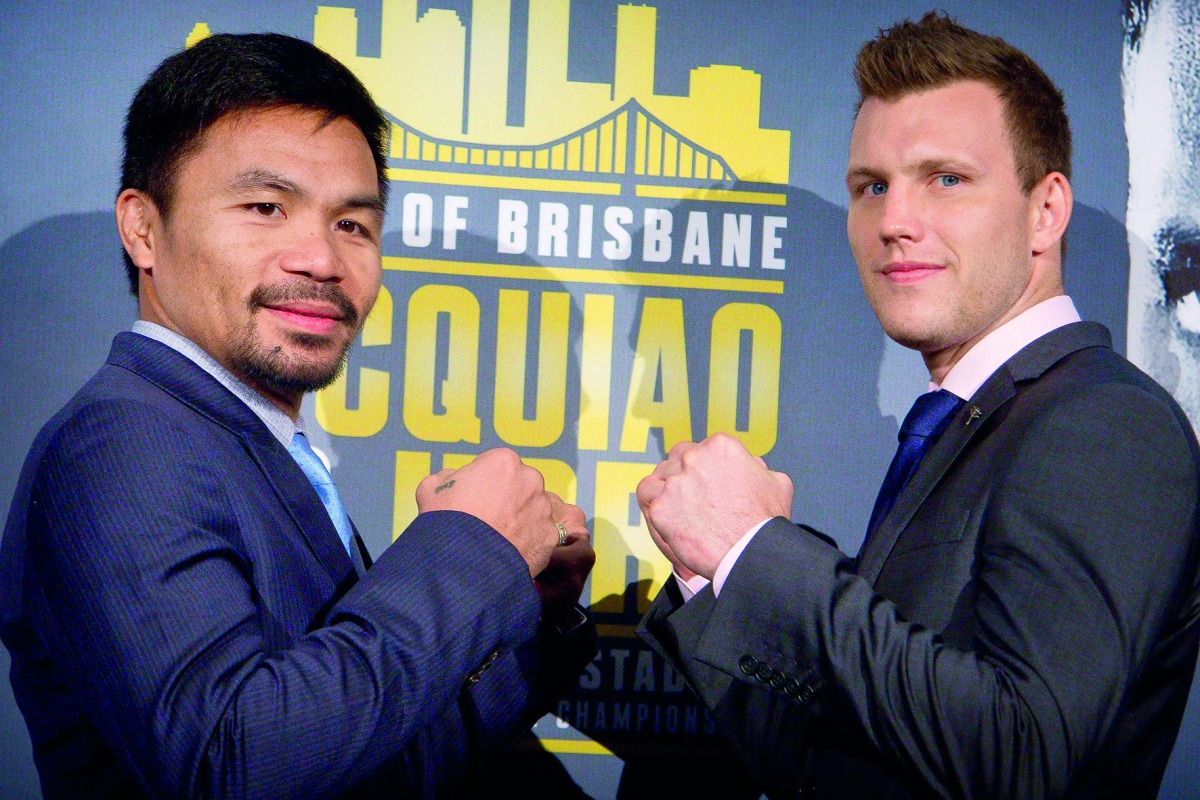 Boxers Manny Pacquiao (left) of the Philippines and Australia’s Jeff Horn stand together following their official news conference ahead of their WBO welterweight fight in Brisbane, Australia in this file photo. Pacquiao’s rematch with Horn has been confir