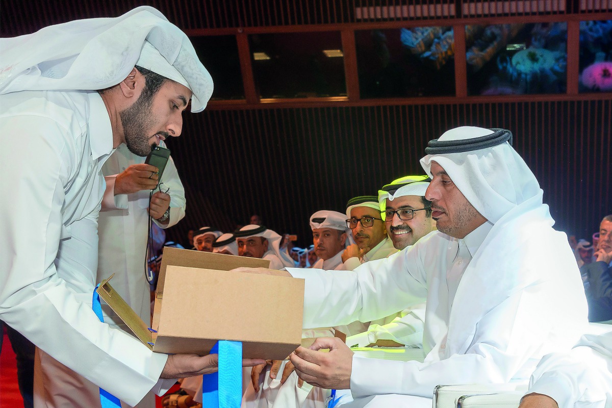 Prime Minister and Interior Minister H E Sheikh Abdullah bin Nasser bin Khalifa Al Thani launching new logo of Qatar Post.