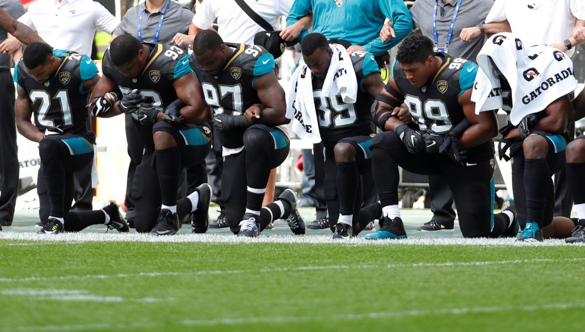 Jacksonville Jaguars players kneel during the U.S. national anthem before a match this past weekend. Reuters/Paul Childs