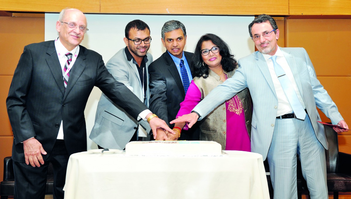 Indian Ambassador P Kumaran (centre); Dr Loui Al Fakhri (right), Head of Staff Training and Development Department at Al Ahli Hospital; Milan Arun (second right), President of ICC; Mohammed Yasir (second left), President of Indian Physiotherapy Forum Qata