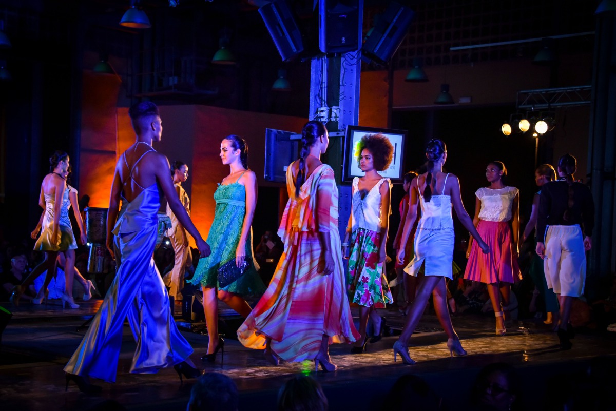 Cuban models walk on stage during the opening of the Havana Fashion Week, on October 25, 2017. AFP / Adalberto Roque