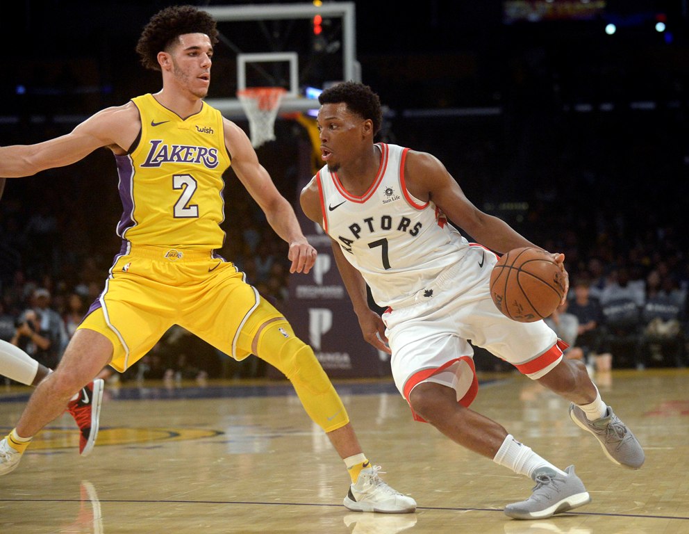 Toronto Raptors guard Kyle Lowry (7) moves the ball against Los Angeles Lakers guard Lonzo Ball (2) during the first half at Staples Center.  Gary A. Vasquez
