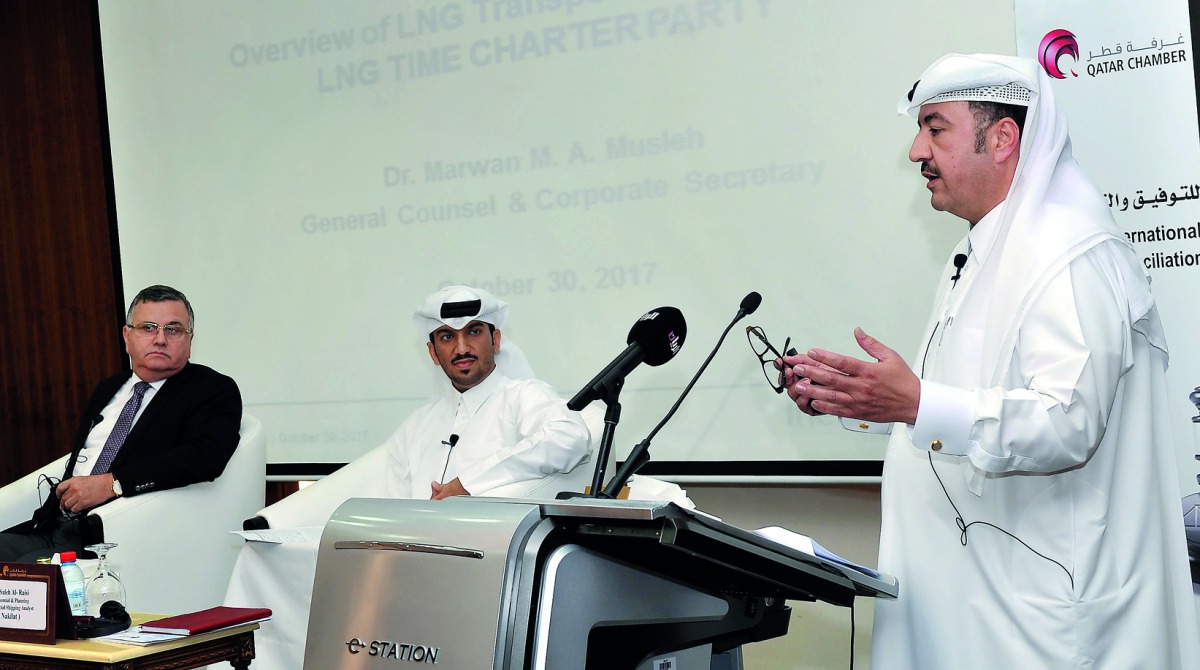 The General Counsel and Corporate Secretary of the RasGas Group of Companies, Dr Marwan M A Musleh (right), speaking at the seminar on Maritime Activity and Contracts of Transportation by Sea in Qatar held at Qatar Chamber yesterday,  with the General Cou