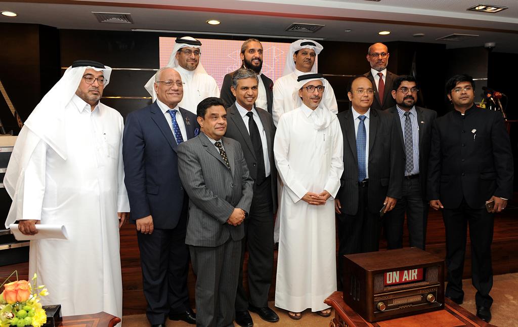 Minister of Culture and Sports H E Salah bin Ghanem Al Ali with Indian Ambassador to Qatar P Kumaran, and other officials and guests at the launch of four bilingual private radio stations at the Ministry headquarters yesterday. Pic: Salim Matramkot / The 