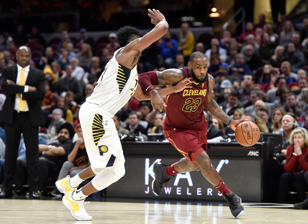 Cleveland Cavaliers forward LeBron James (23) drives against Indiana Pacers guard Darren Collison (2) in the fourth quarter at Quicken Loans Arena. David Richard
