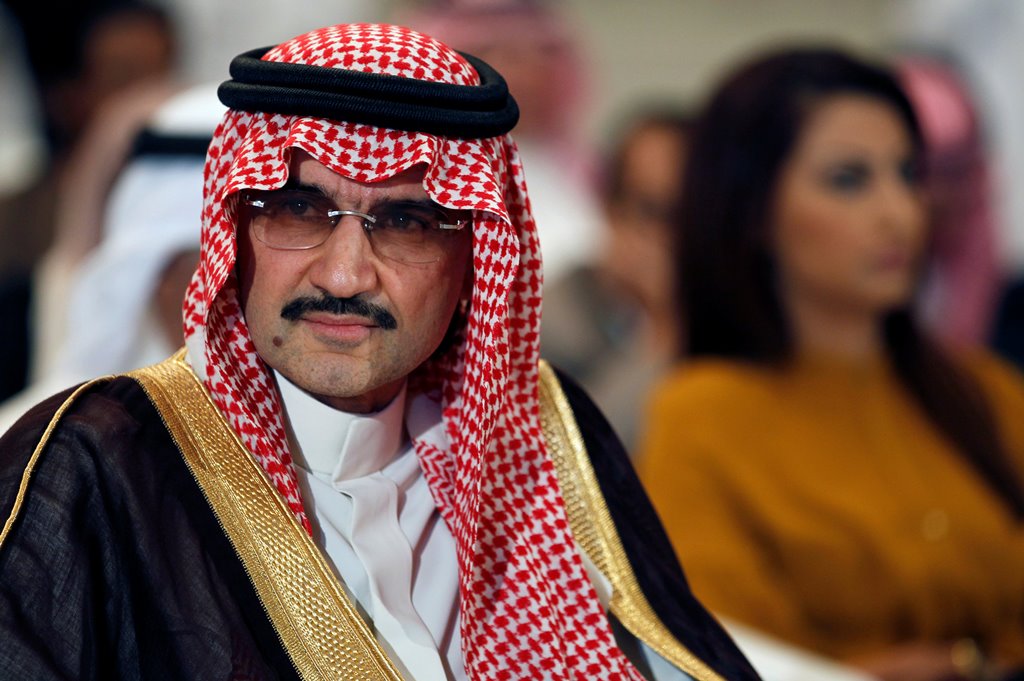 FILE PHOTO - Saudi billionaire Prince AlWaleed bin Talal looks on during a news briefing in Manama, May 8, 2012. REUTERS/Hamad I Mohammed/File Photo
