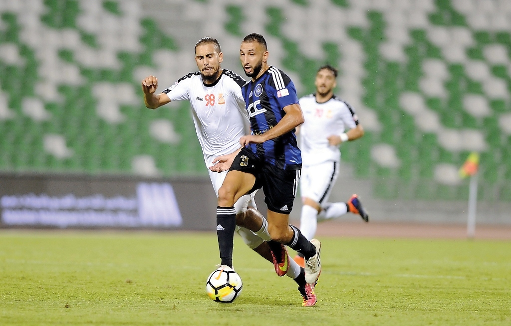 Al Sailiya player Nadir Belhadj (right) and Umm Salal’s Youcef Sekour vie for the ball possession during their QNB Stars League (QSL) match at Al Ahli Stadium yesterday. 
Picture: Abdul Basit/The Peninsula 