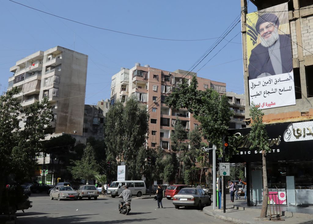 A picture taken on November 5, 2017 shows a banner bearing a portrait of Lebanon's Hezbollah chief Hasan Nasrallah in the capital Beirut. / AFP / ANWAR AMRO
