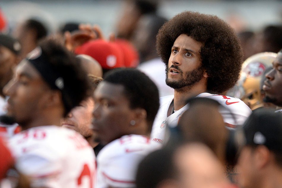 FILE PHOTO: Sep 1, 2016; San Diego, CA, USA; Colin Kaepernick (7) looks on before the national anthem against the San Diego Chargers at Qualcomm Stadium. Mandatory Credit: Jake Roth-USA TODAY Sports / Reuters Picture Supplied by Action Images