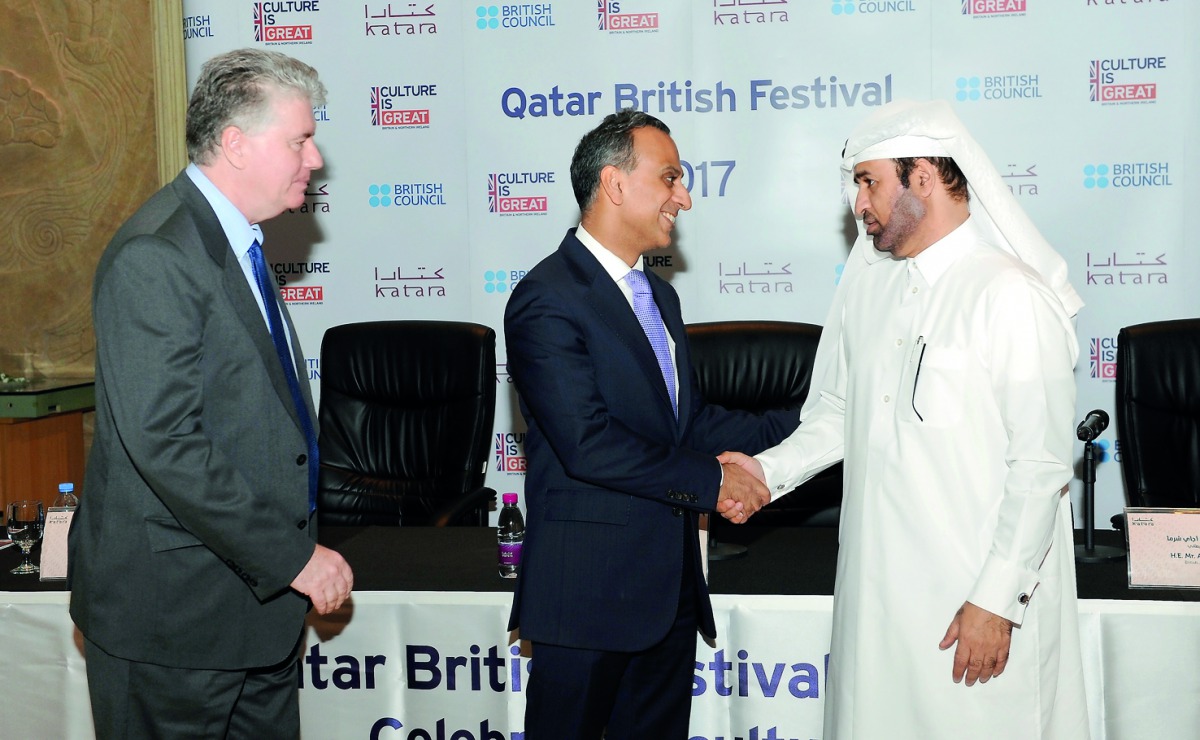 Dr Khalid bin Ibrahim Al Sulaiti (right), General-Manager, Cultural Village Foundation Katara, greets Ajay Sharma, British Ambassador to Qatar, after the launch of Qatar British Festival 2017, yesterday. Dr Frank Fitzpatrick (left), Director, British Coun