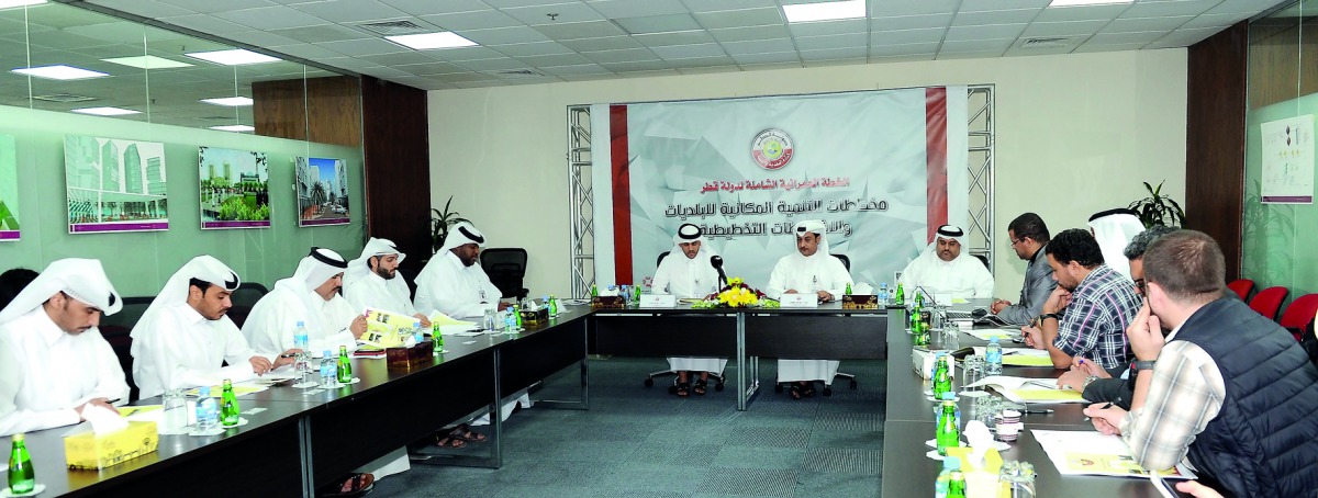 Senior officials of the Ministry of Municipality and Environment speak during the press conference held yesterday to provide the details of the master development plan on spatial development schemes for the municipalities and new planning guidelines for Q