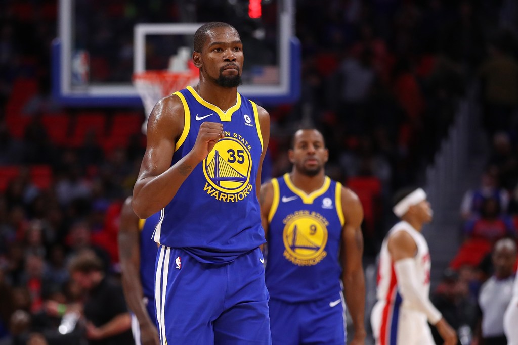 Kevin Durant #35 of the Golden State Warriors reacts to two three made free throws in the fourth quarter while playing the Detroit Pistons at Little Caesars Arena on December 8, 2017 in Detroit, Michigan.   Gregory Shamus/AFP
