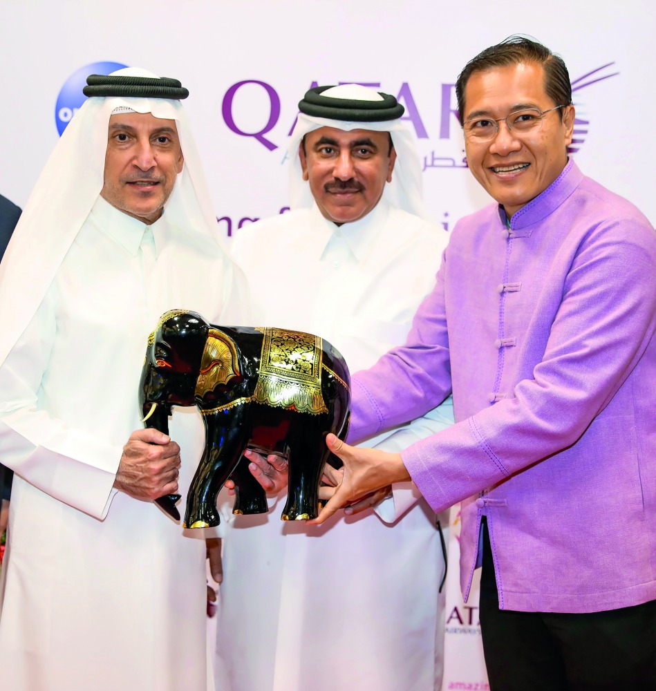 Minister of Transport and Communications H E Jassim bin Saif Al Sulaiti with Qatar Airways Group Chief Executive Akbar Al Baker being welcomed at the Chiang Mai International Airport.