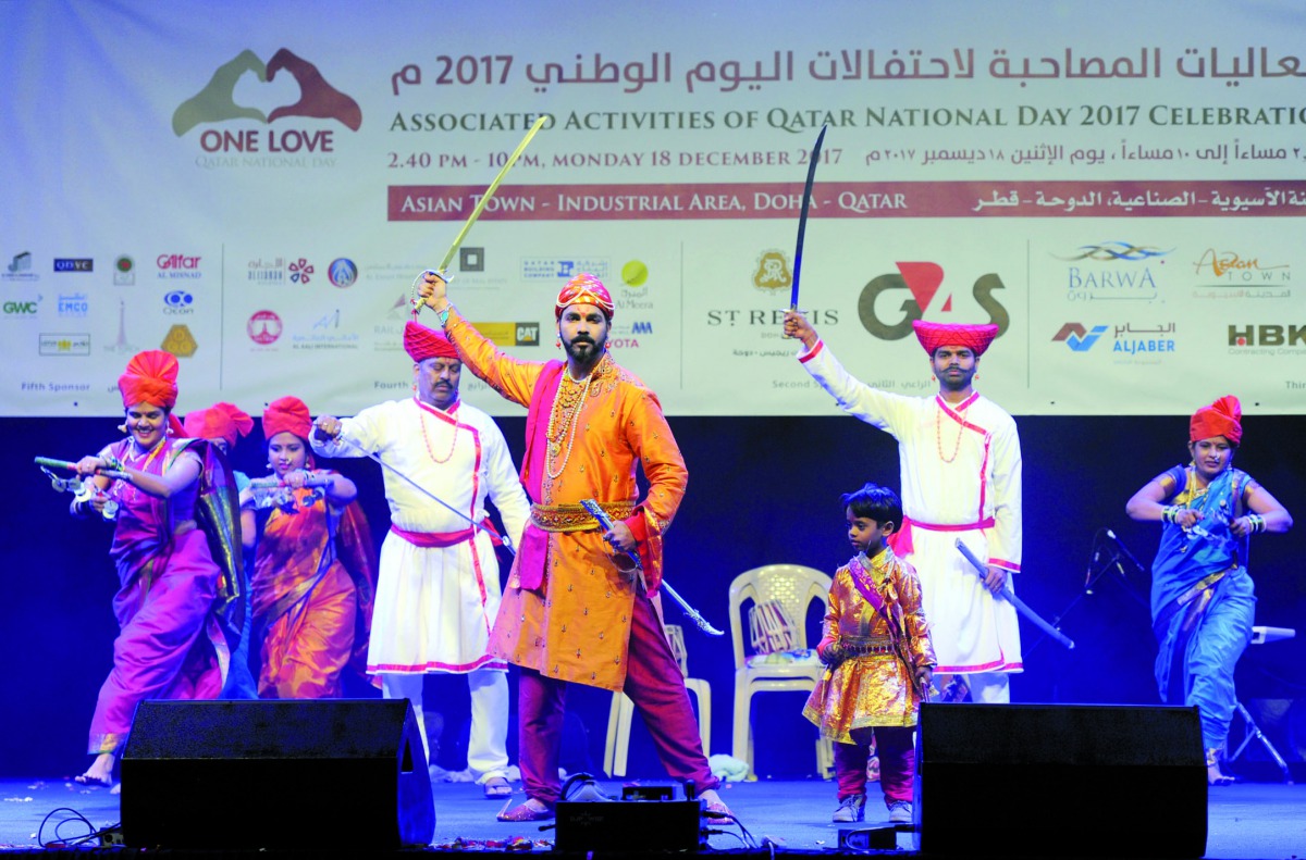 Qatar National Day celebrations at Asian town yesterday. Pics: Abdul Basit / The Peninsula 