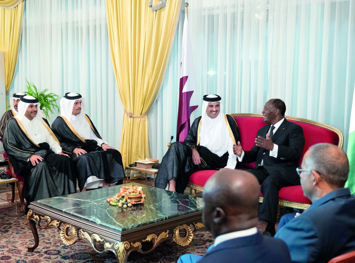 Emir H H Sheikh Tamim bin Hamad Al Thani talking with Cote d’Ivoiree President Alassane Ouattara in Abidjan, yesterday.