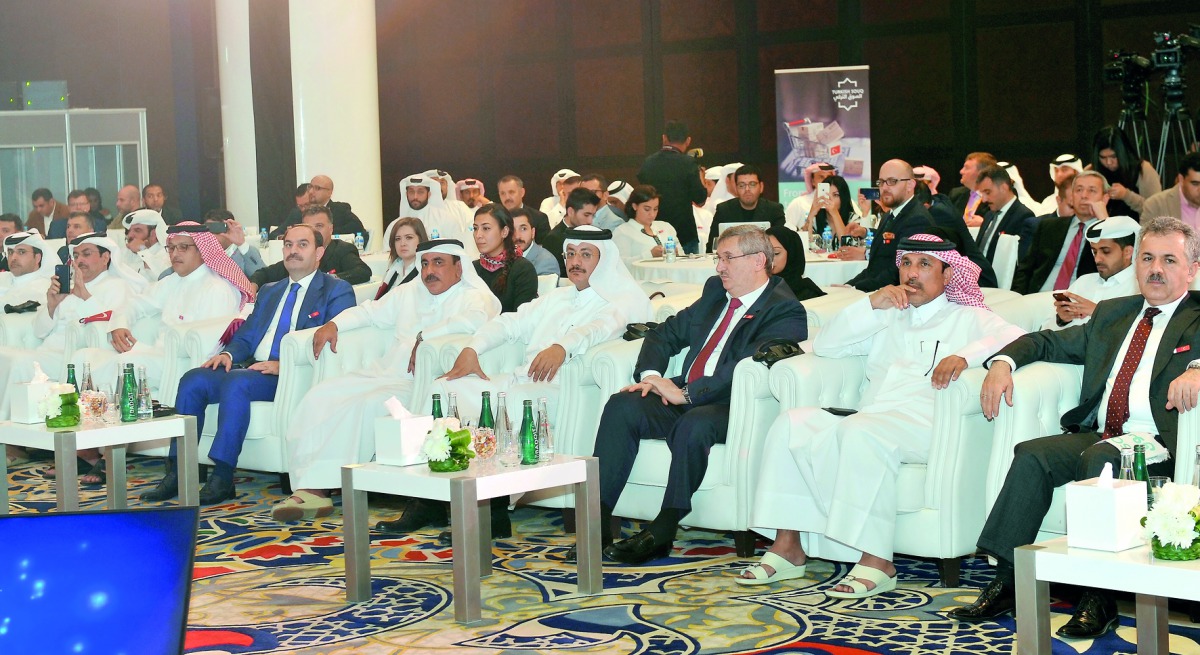 Minister of Transport and Communications, H E Jassim bin Saif Al Sulaiti (centre), Faleh Al Naemi (fourth right), Chairman and Managing Director of Qatar Post, Kenan Bozgeyik (fourth left), CEO of Turkish Post, Fikret Ozer (third right), Ambassador of Tur