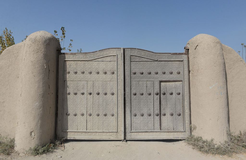 In this photograph taken on November 8, 2017 shows the gate of the ninth-century mosque Masjid-e Haji Piyada (mosque of the walking pilgrim) in Balkh Province. AFP / Farshad Usyan 