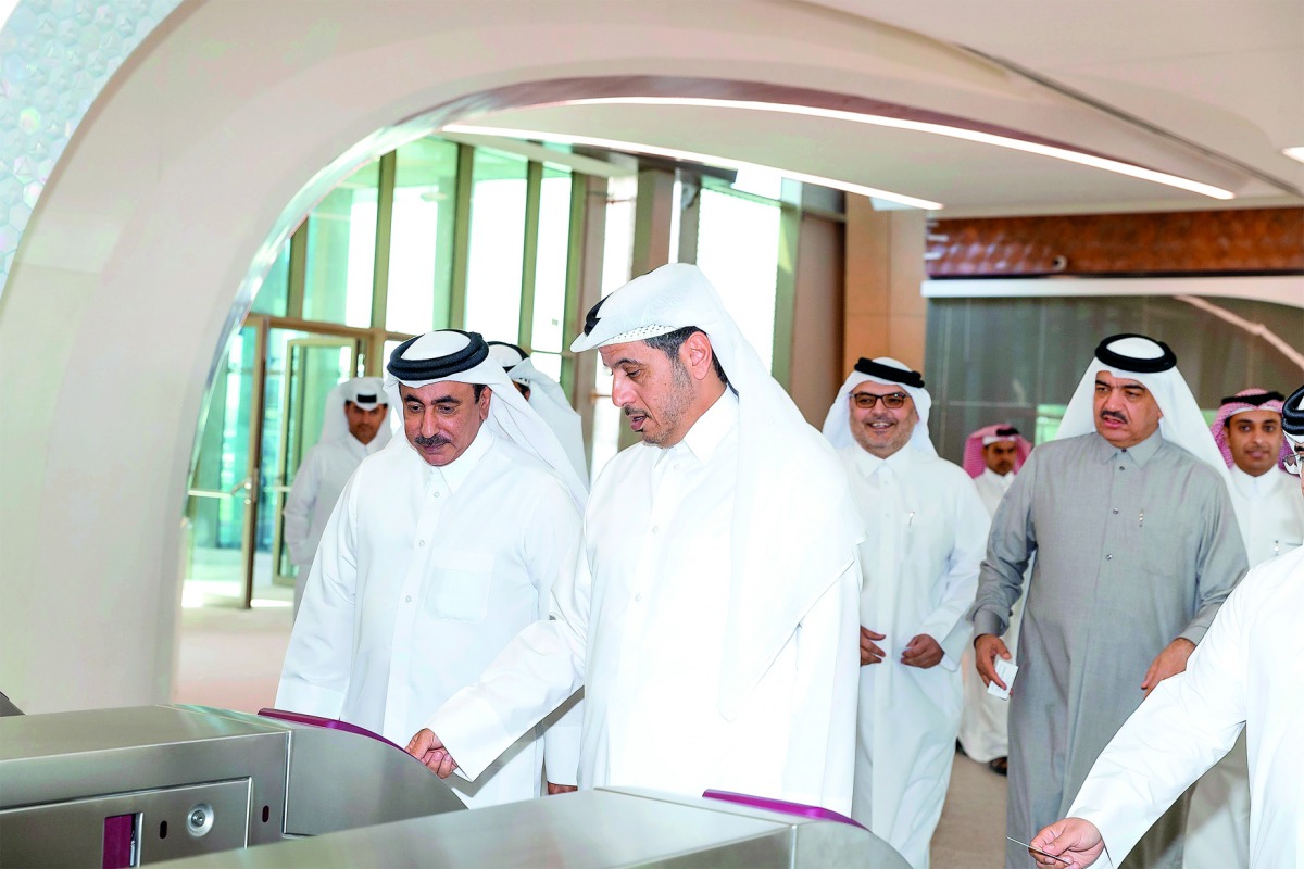 Prime Minister and Interior Minister H E Sheikh Abdullah bin Nasser bin Khalifa Al Thani and Minister of Transport and Communications H E Jassim bin Saif Al Sulaiti and other officials at the Doha Metro Economic Zone Station, yesterday.