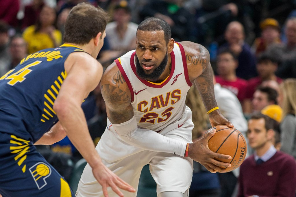 Cleveland Cavaliers forward LeBron James (23) looks to dribble while Indiana Pacers forward Bojan Bogdanovic (44) defends in the first half at Bankers Life Fieldhouse. Mandatory Credit: Trevor Ruszkowski
