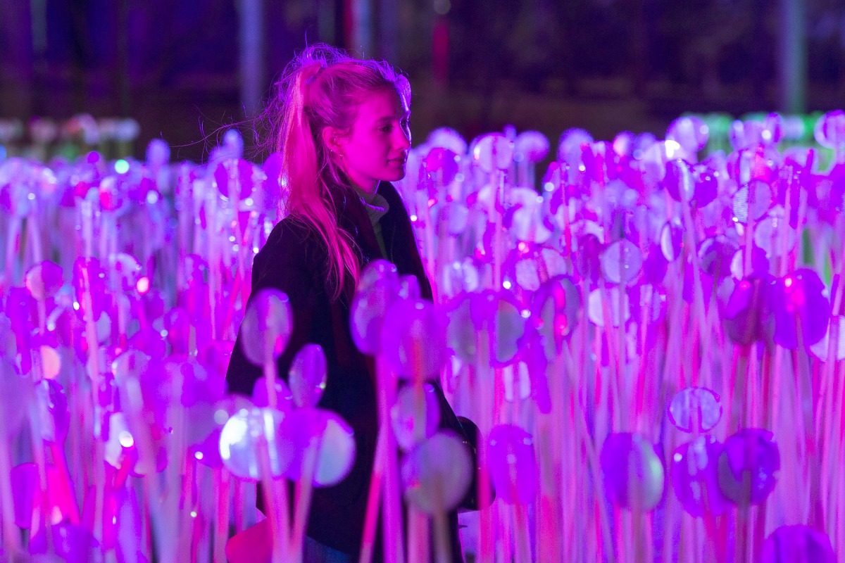 A visitor looks at a light installation during the Lumiere Festival 2018 in London, yesterday.