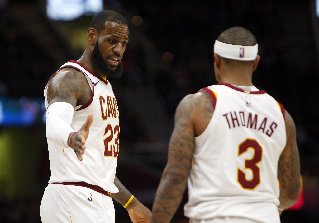 LeBron James #23 of the Cleveland Cavaliers and Isaiah Thomas #3 of the Cleveland Cavaliers react to a foul against the Orlando Magic at Quicken Loans Arena on January 18, 2018 in Cleveland, Ohio.   Justin K. Aller/AFP
