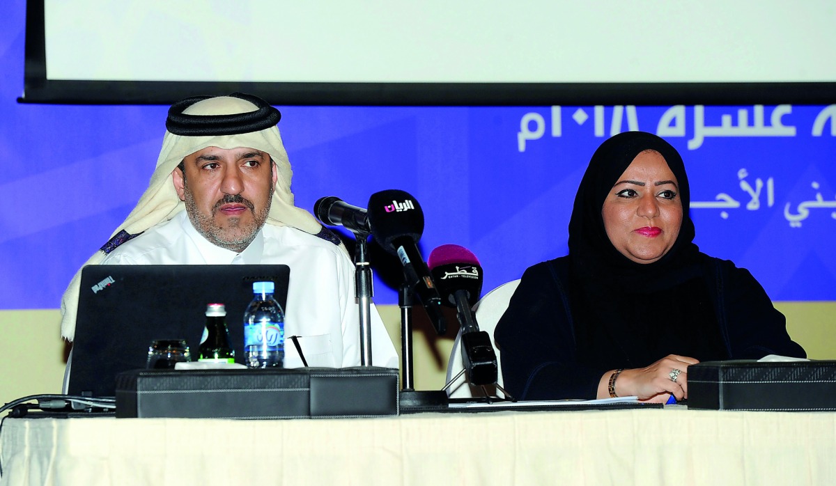 Mona Mohammed Al Kuwari (right), Executive Vice-President of the Scientific Excellence Awards, with Hassan Abdullah Al Mohammadi, Chairman of the executive committee of the award, at the event. PIC: Abdul Basit / The Peninsula