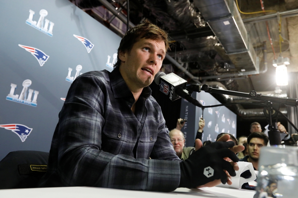 New England Patriots quarterback Tom Brady speaks during a media availability ahead of the Super Bowl in Minneapolis, Minnesota, US February 1, 2018. REUTERS/Kevin Lamarque 