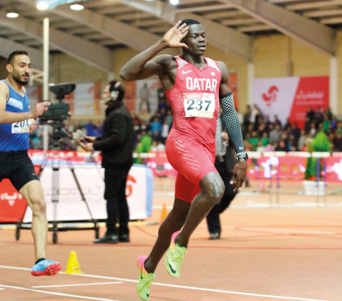 Qatari athlete Abdalelah Haroun gestures as he crosses the finish line to win the men’s 400 metres event during the 8th Asian Indoor Athletics Championships held in Tehran, Iran on Friday.