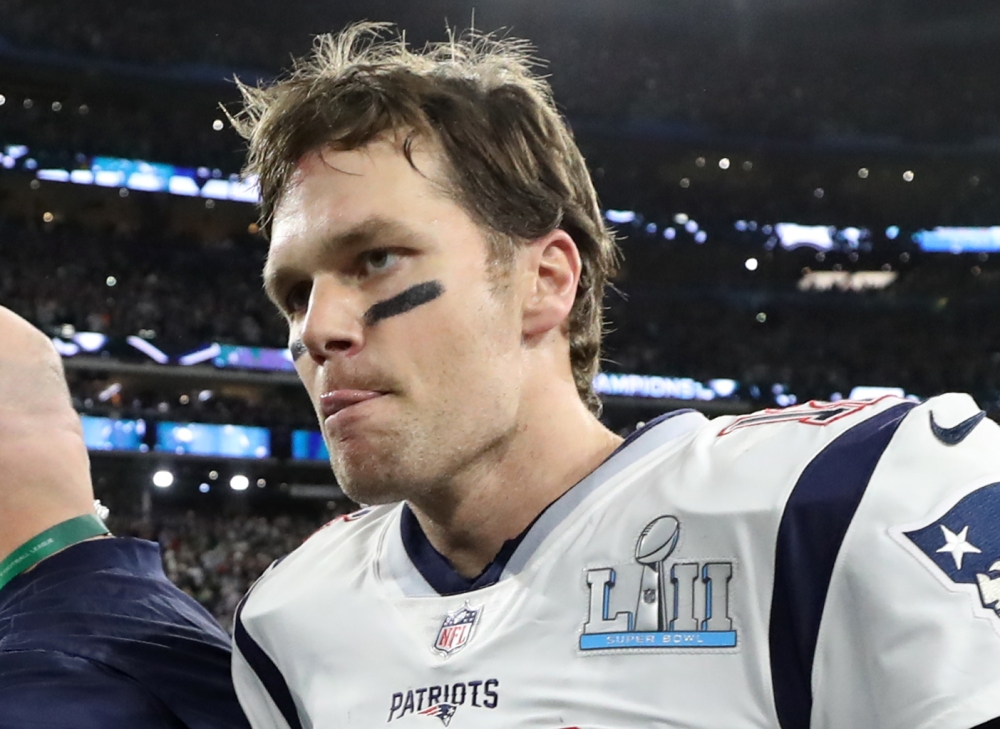 Image of New England Patriots' Tom brady as he walks off dejected after the game, February 4, 2018. REUTERS/Chris Wattie