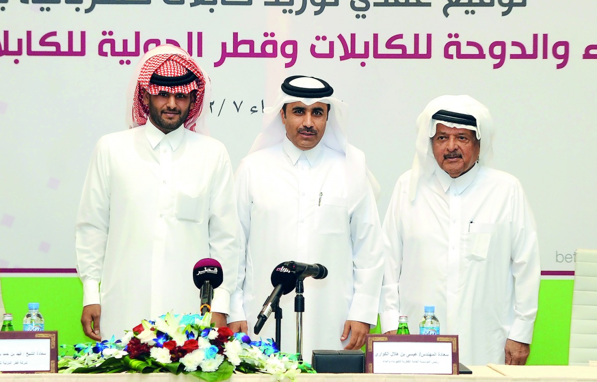 Kahramaa President Eng Essa bin Hilal Al Kuwari (centre), Sheikh Faisal bin Qassim Al Thani (right) and Sheikh Fahd bin Hamad Al Thani during the ceremony.