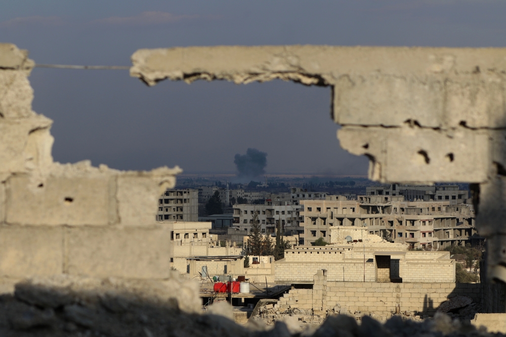 Smoke rises after Assad Regime carried out an airstrike to Arbin town of Eastern Ghouta in Damascus, Syria on February 24, 2018. Diaa Al Din - Anadolu