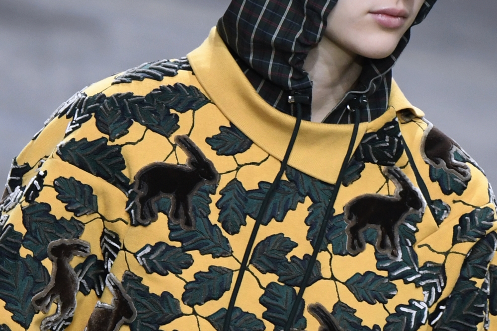 A model presents a creation for Lacoste during the 2018/2019 fall/winter collection fashion show on February 28, 2018 in Paris. (AFP / BERTRAND GUAY)