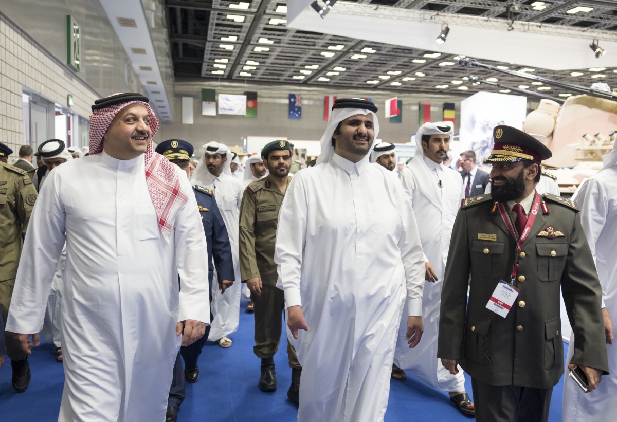 Deputy Emir H H Sheikh Abdullah bin Hamad Al Thani, Deputy Prime Minister and Minister of State for Defence Affairs H E Dr Khalid bin Mohamed Al Attiyah and other officials at Dimdex 2018, yesterday.  