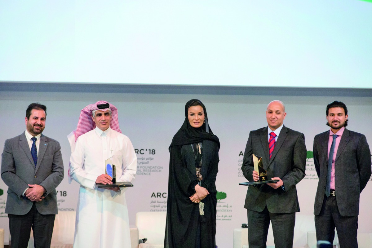 H H Sheikha Moza bint Nasser with the winners of the Best Research and Best Innovation Awards during Qatar Foundation Annual Research Conference 2018 at the Qatar National Convention Center, yesterday.  Pic: Aisha Al Musallam