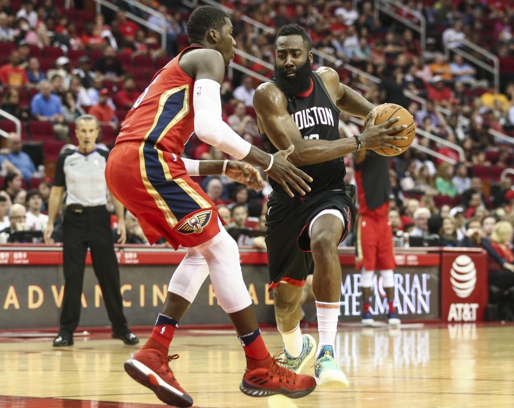 Houston Rockets guard James Harden (13) attempts to drive the ball past New Orleans Pelicans forward Cheick Diallo (13) during the first quarter at Toyota Center. Troy Taormina
