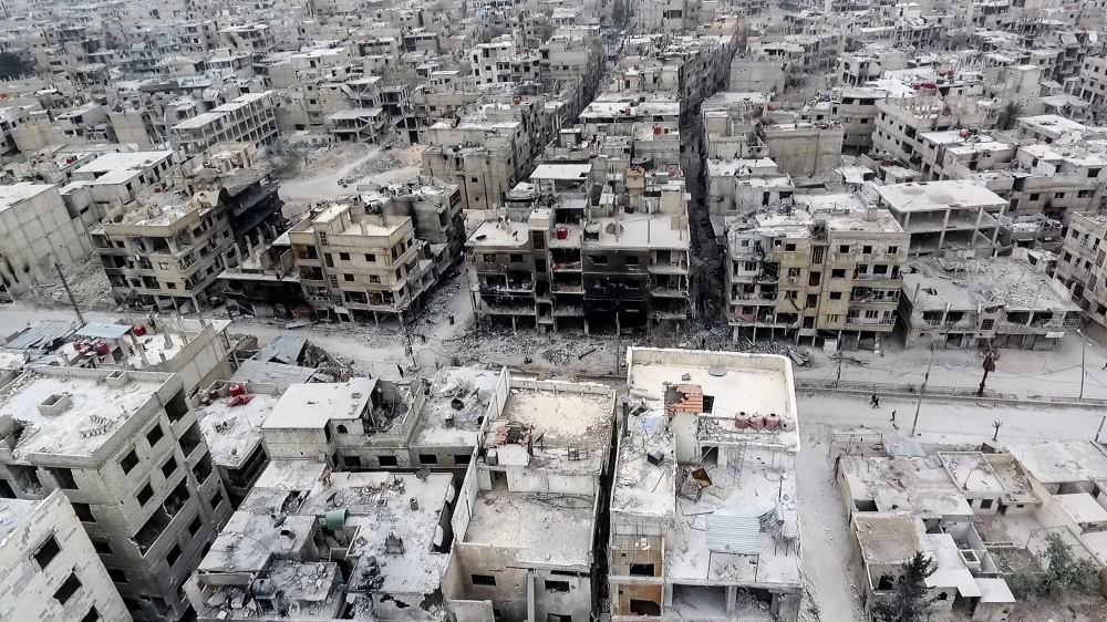 A footage captured by an unmanned aerial vehicle shows wreckages of structures of Arbin town, which has been under siege of Assad Regime, in Arbin town of Eastern Ghouta region, Damascus, Syria on March 27, 2018.   Ammar Al Bushy - Anadolu 
