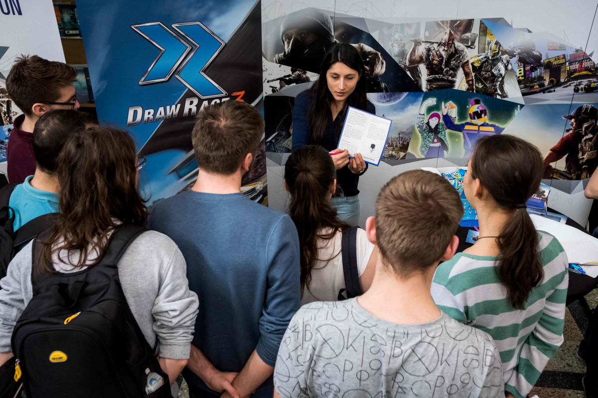 REPRESENTATIVE IMAGE: Romanian computer science students take part in an internship fair on the campus of the Polytechnic University on March 17, 2017 in Bucharest. (AFP / Andrei Pungovschi) 