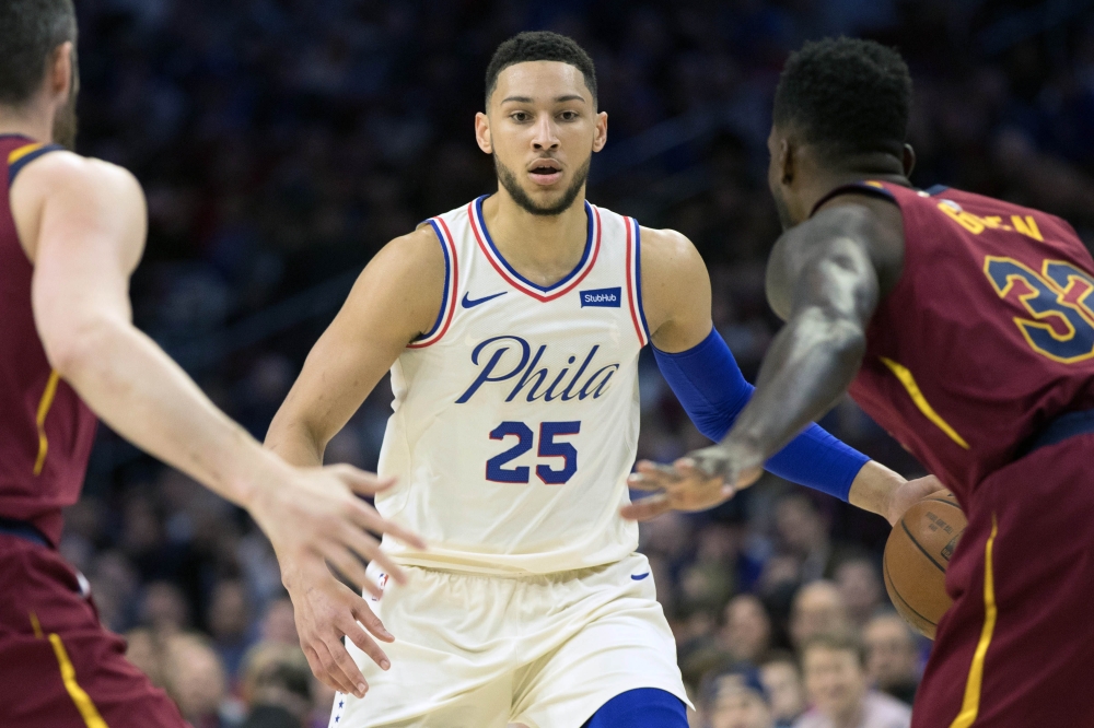 Philadelphia 76ers guard Ben Simmons (25) dribbles the ball against the Cleveland Cavaliers during the first quarter at Wells Fargo Center. Bill Streicher