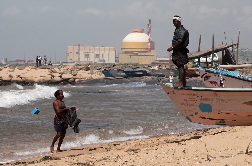 A fisherman stands on his boat on a beach near Kudankulam nuclear power project in Tamil Nadu, India, September 13, 2012. (Reuters / Adnan Abidi) 