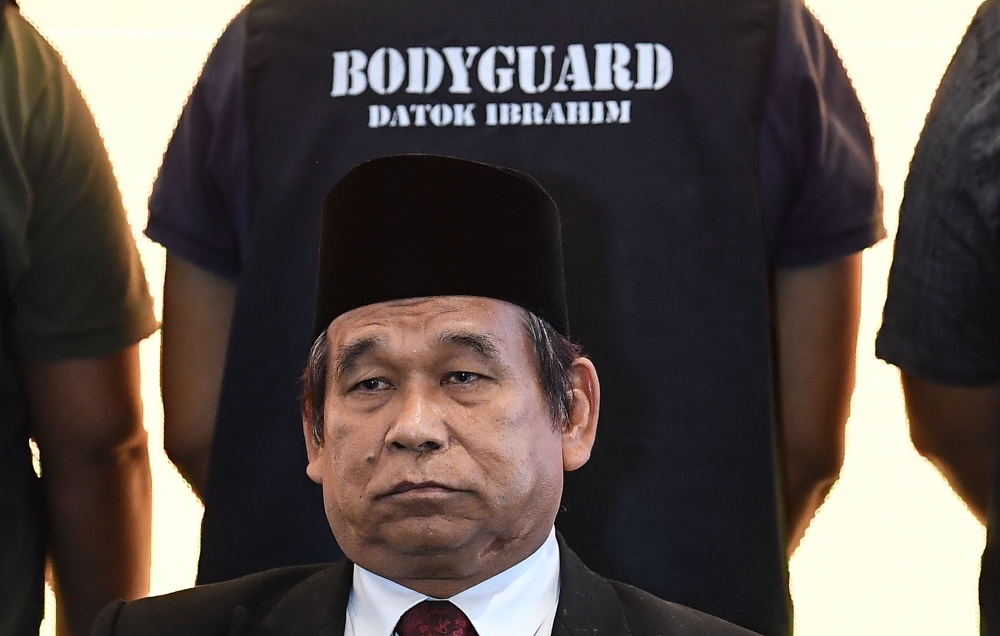 Malaysia's King of Bomoh, Ibrahim Mat Zin, 68, attends a press conference in Malaysia's northern town of Ipoh on April 17, 2018. AFP