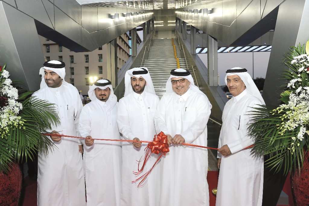 Dr Saad bin Ahmed bin Ibrahim Al Mohannadi, President of the Public Works Authority, Ashghal (second right), inaugurating the Al Matar Street pedestrian bridge, as other officials from various entities look on. Pic: Salim Matramkot / The Peninsula