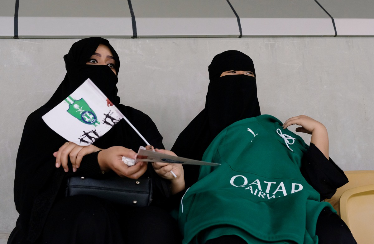 Saudi women watch the soccer match between Al-Ahli against Al-Batin at the King Abdullah Sports City in Jeddah, January 12, 2018. (Reuters / Reem Baeshen) 